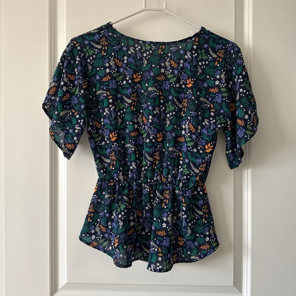 Sienna Sky Navy Floral Peplum Blouse with Green & Orange Accents - Picture 5 of 7